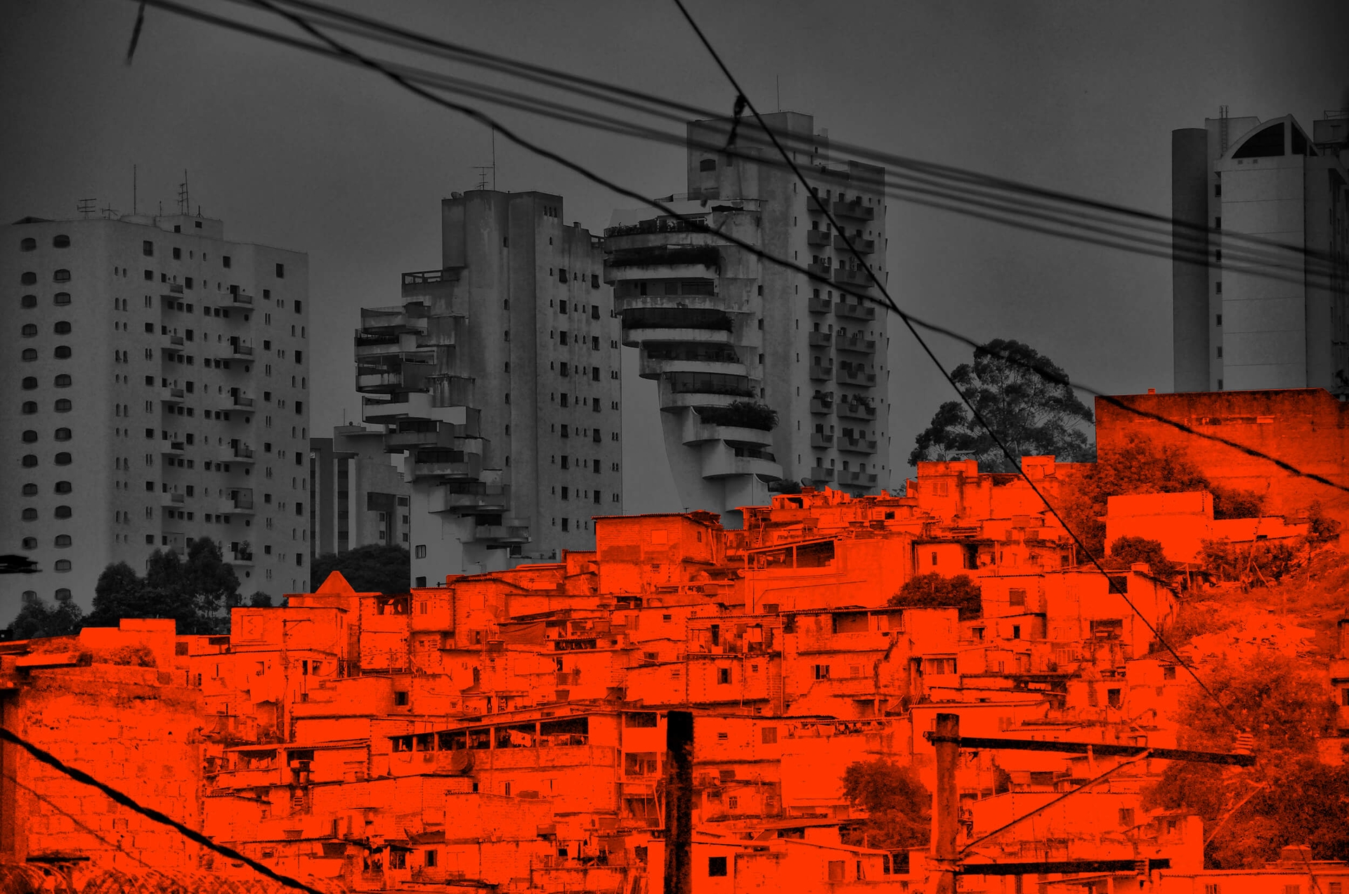The towers of Morumbi neighbourhood are contrasted with the Paraisópolis favela, symbolizing the gap between rich and poor.